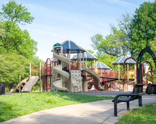 Colorful climbing equipment and slides at Oakley Playground