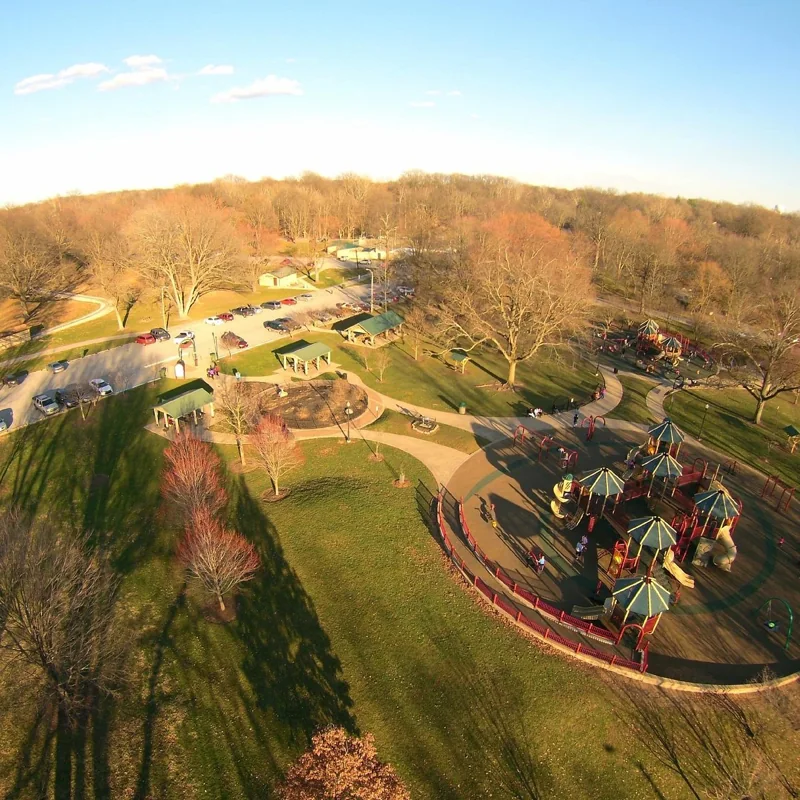 Picnic shelters and green lawns beside the playground